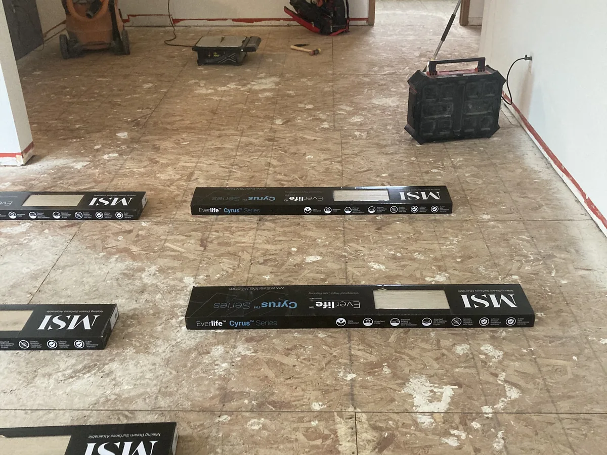 Vinyl plank flooring job prep in a Milwaukee home